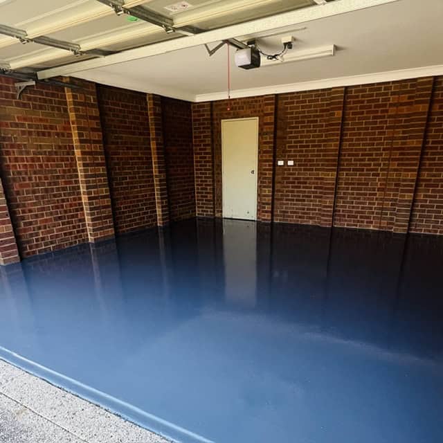 High-quality epoxy coated garage with durable, smooth finish.