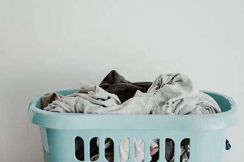 Laundry basket full of dirty clothes